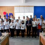 Rektor ITN Malang, Awan Uji Krismanto, ST., MT., Ph.D., (jas hitam) berdampingan dengan Sekretaris Ditjen Penataan Ruang Laut KKP, Dr. Effin Martiana, SH., MH., beserta para peserta workshop.